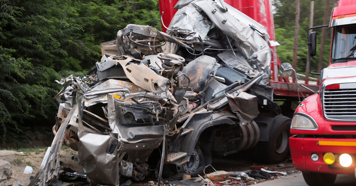 An image showing the aftermath of an 18 wheeler crash in Gadsden, Alabama.